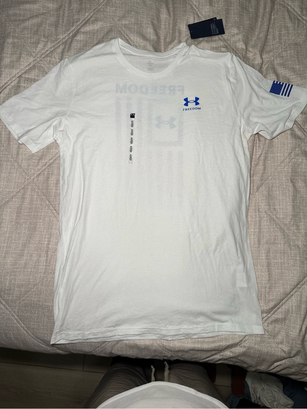 Under Armour White Short Sleeve Freedom Performance Tee with Blue Logo